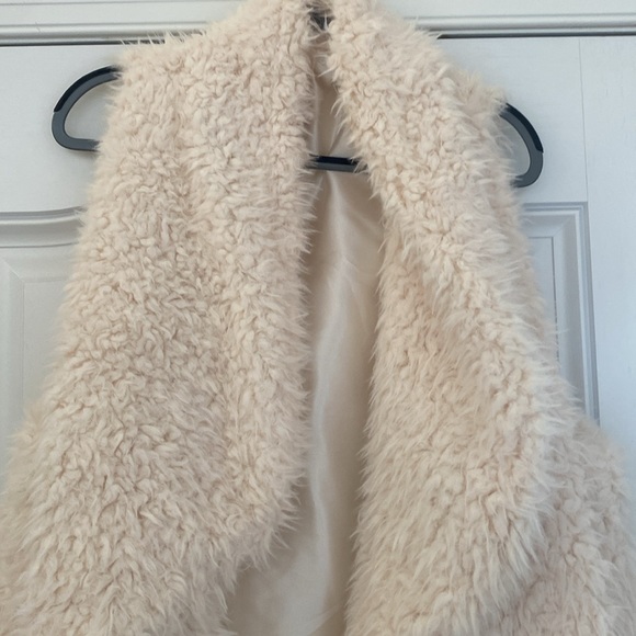 Fluffy ivory sweater vest.  Size L/XL - Picture 2 of 4